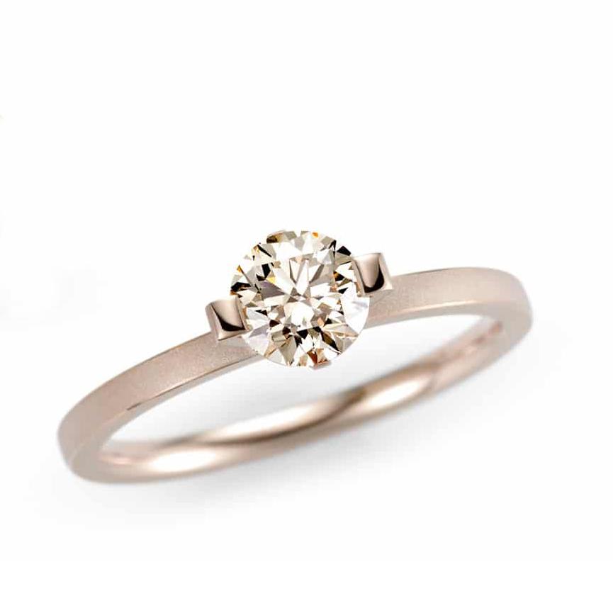Princess Ring by Niessing 18k rosewood gold - Davidson JewelsNiessing Engagement Ring