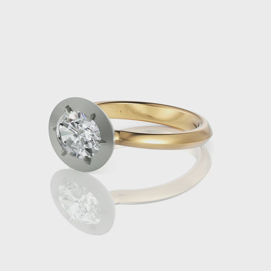 Rosalind oval cut diamond ring features a vintage button-back style in high polished 18k yellow and white gold, making it a timeless piece of artistry and craftsmanship. video